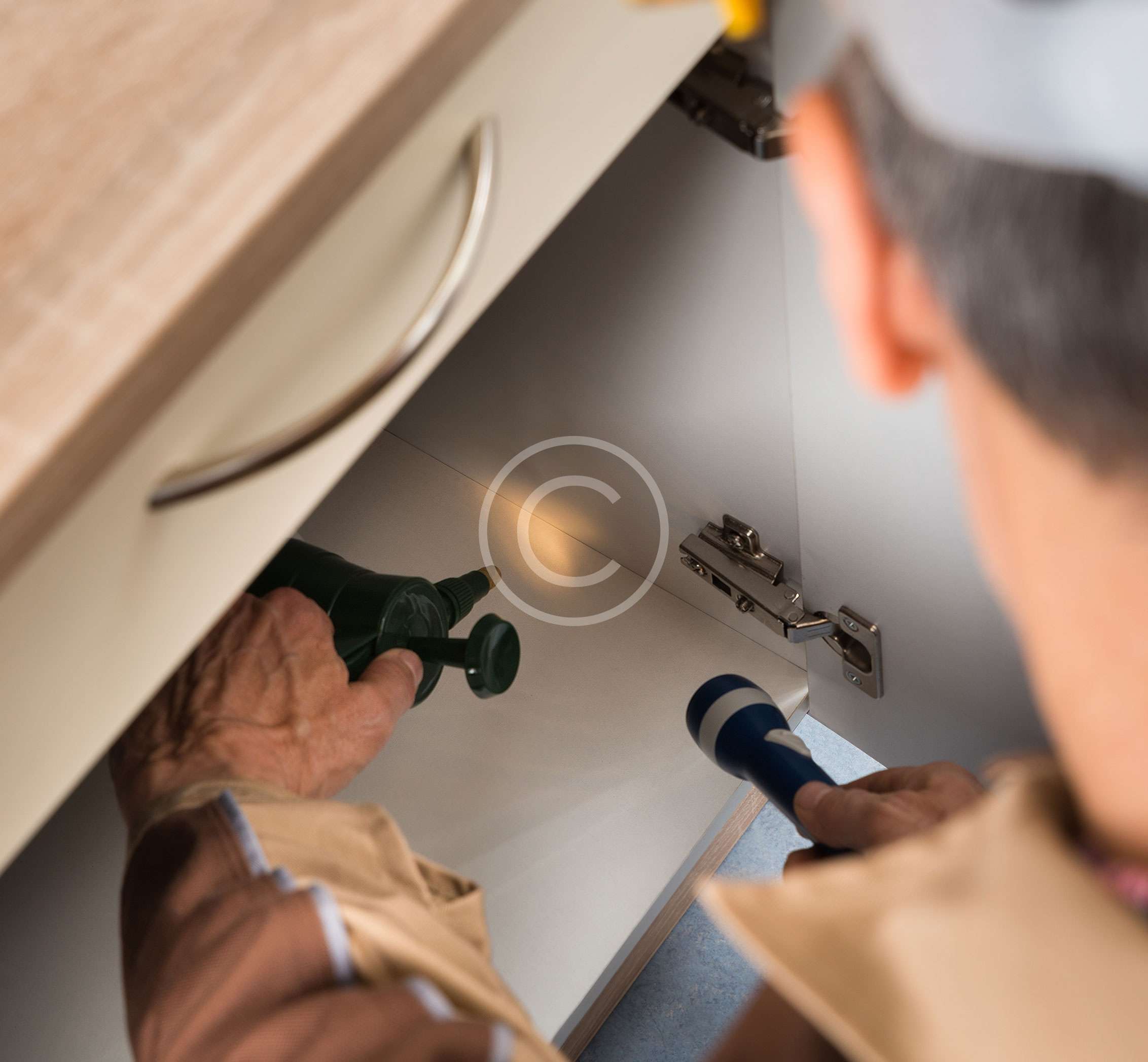 Technician performing exterior service